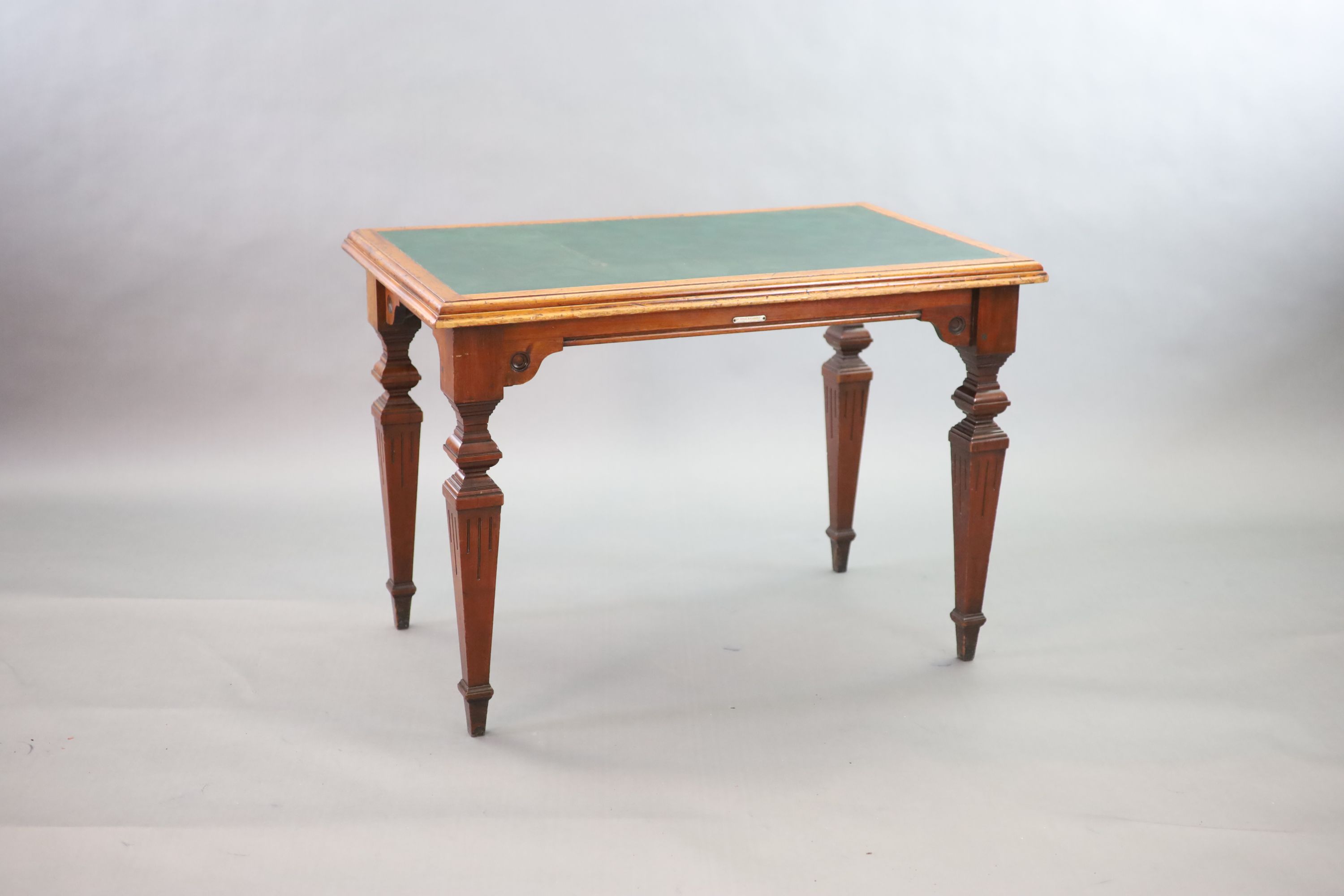 A Victorian mahogany library table, supplied by Sage & Co. Shopfitters of London, W.113cm D.69cm H.78cm